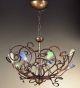 Schizzo Design Chandelier With Hand Bent Arms And Blown Glass