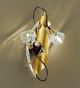 Spirale design forged metal short wall lamp with blown glass details