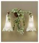 Edera Design 2 Light wall lamp That has hand forged leaves details