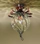 Soffiati chandelier in the shape of a flower bud made from iron & blown glass