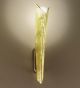 Virgola design long metal wall lamp that in decorated is gold leaf and silver leaf