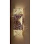 Forme design square metal wall light that has drill & flame cut centre details