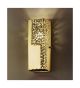 Forme Design gold wall light that has drill, flame cut & glass details